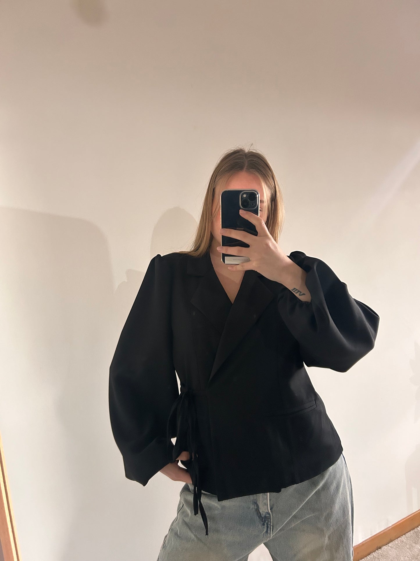Blazer Tella